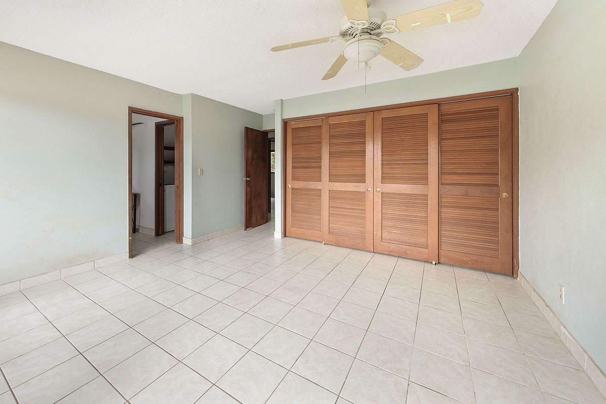 4701 Kawaihau Road, Unit A101 Kapaa, HI 96746 - Photo 8 of 25 an empty room with windows