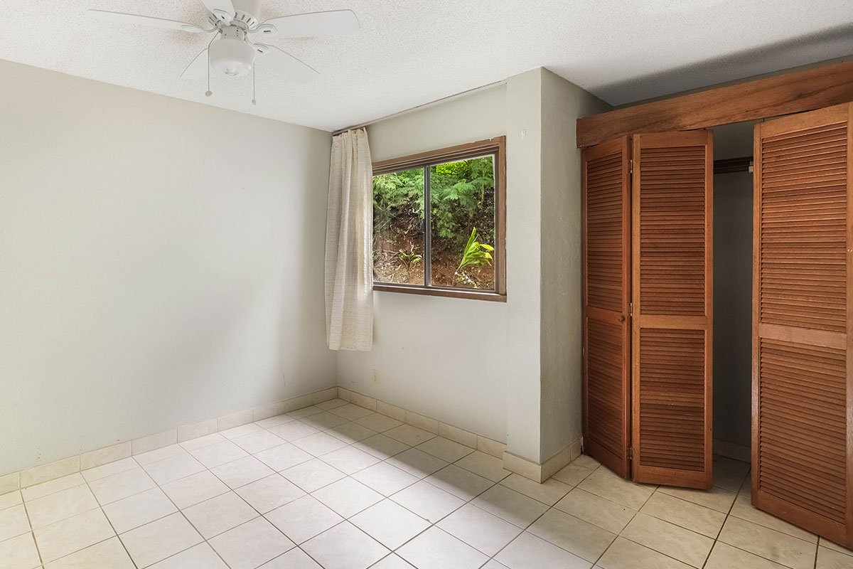 4701 Kawaihau Road, Unit A101 Kapaa, HI 96746 - Photo 9 of 25 an empty room with windows