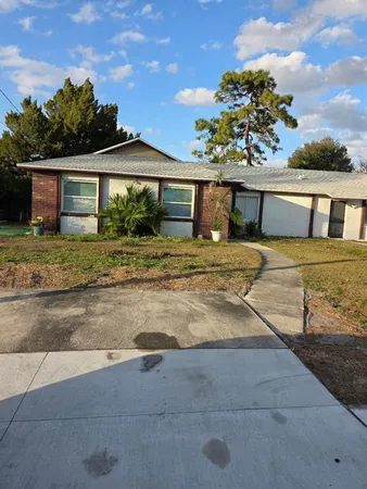 a house view with a outdoor space