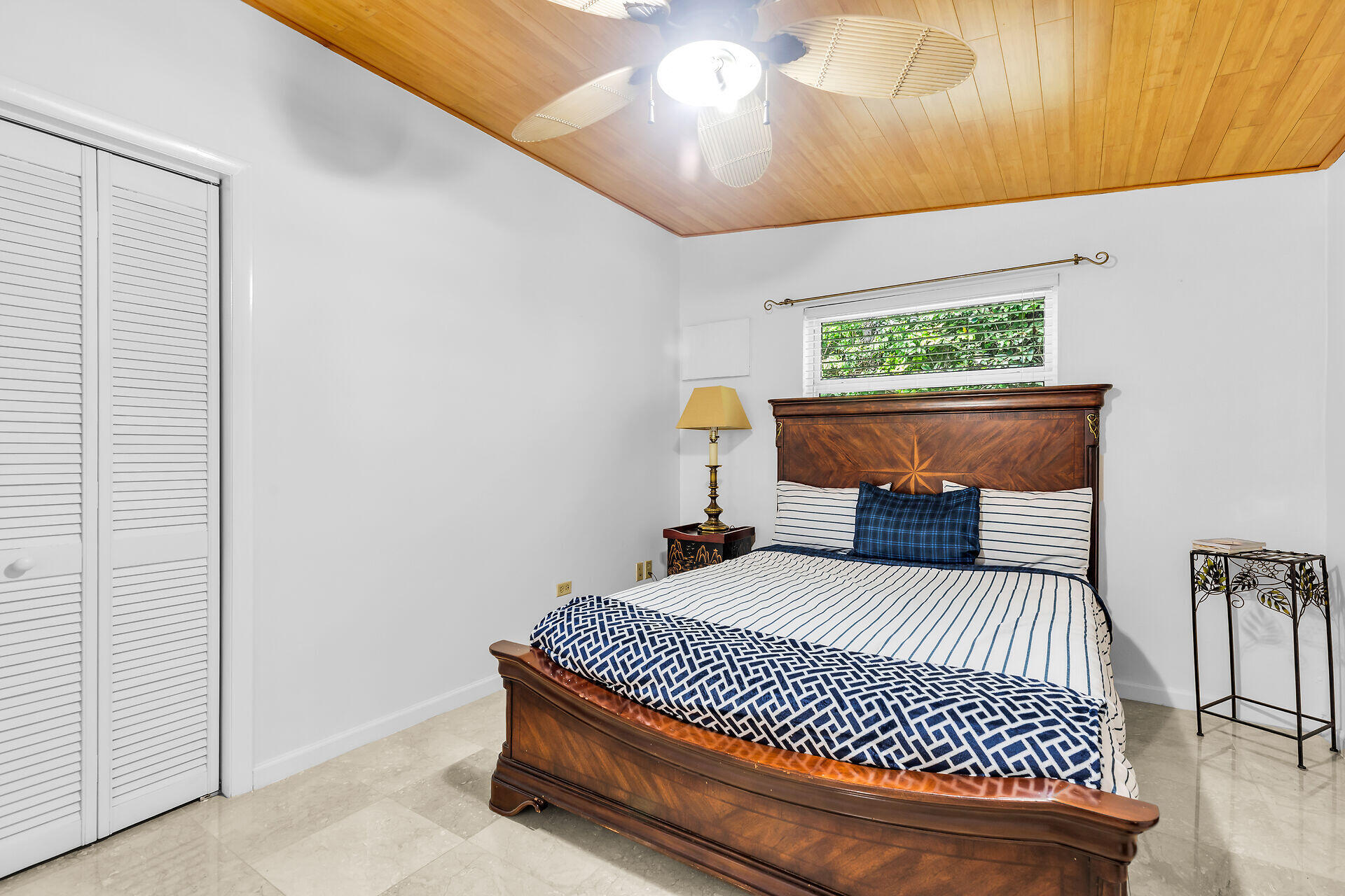 13 Bass Avenue Key Largo, FL 33037 - Photo 19 of 43 a bedroom with a bed and window