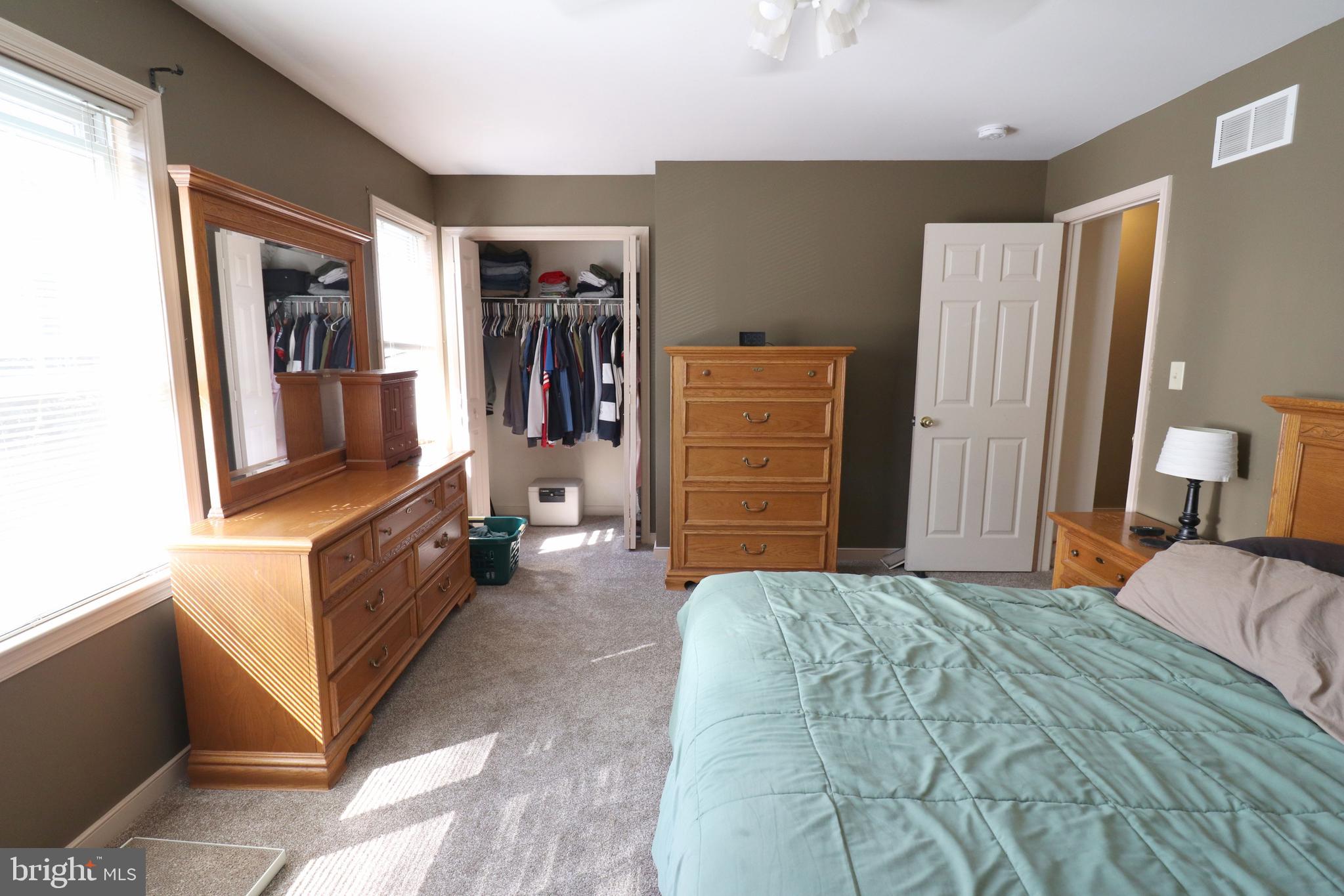 641 Chickadee Drive Lititz, PA 17543 - Photo 19 of 42 a bedroom with a bed and walk in closet