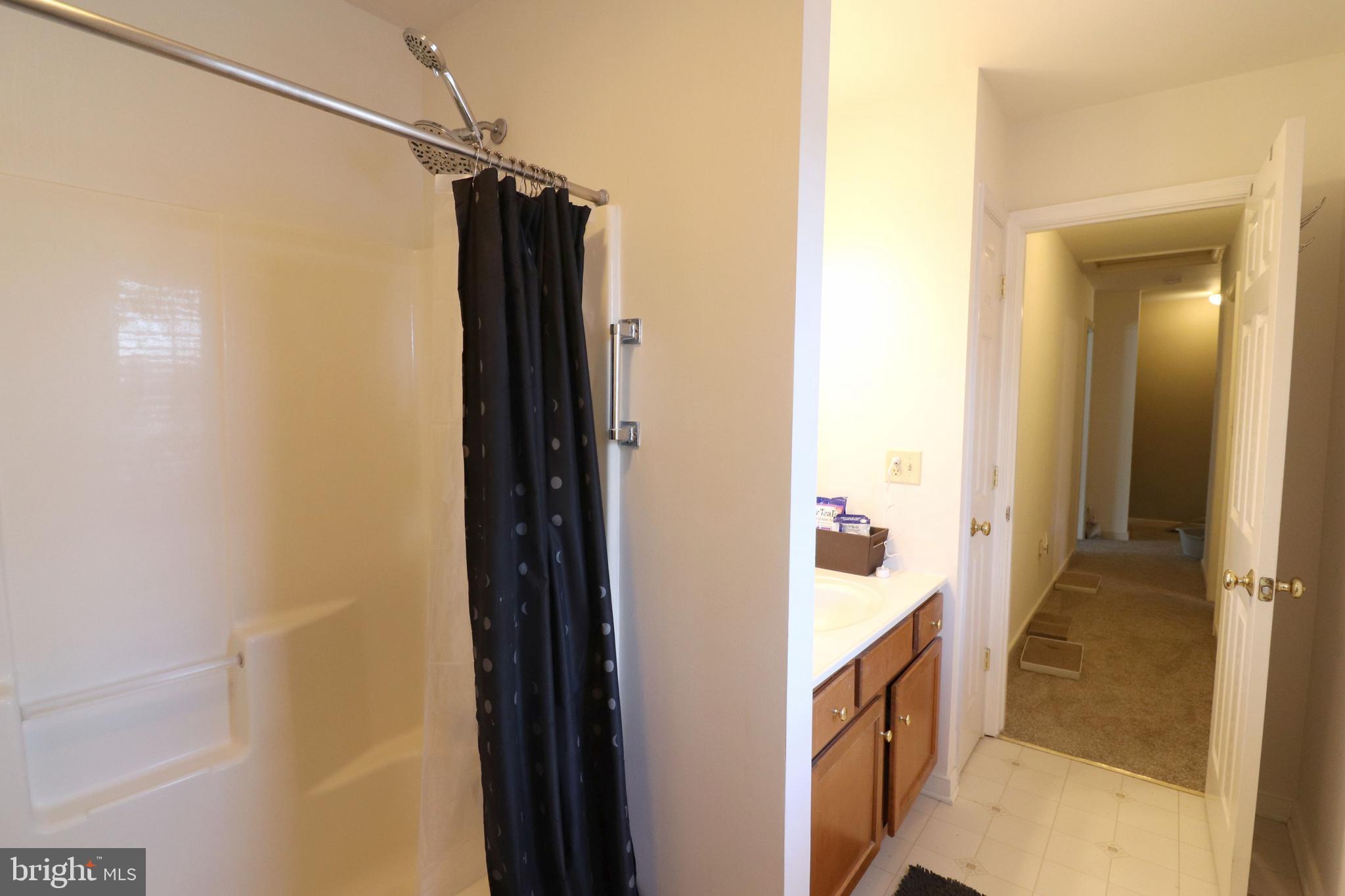 641 Chickadee Drive Lititz, PA 17543 - Photo 25 of 42 a bathroom with a shower and a sink