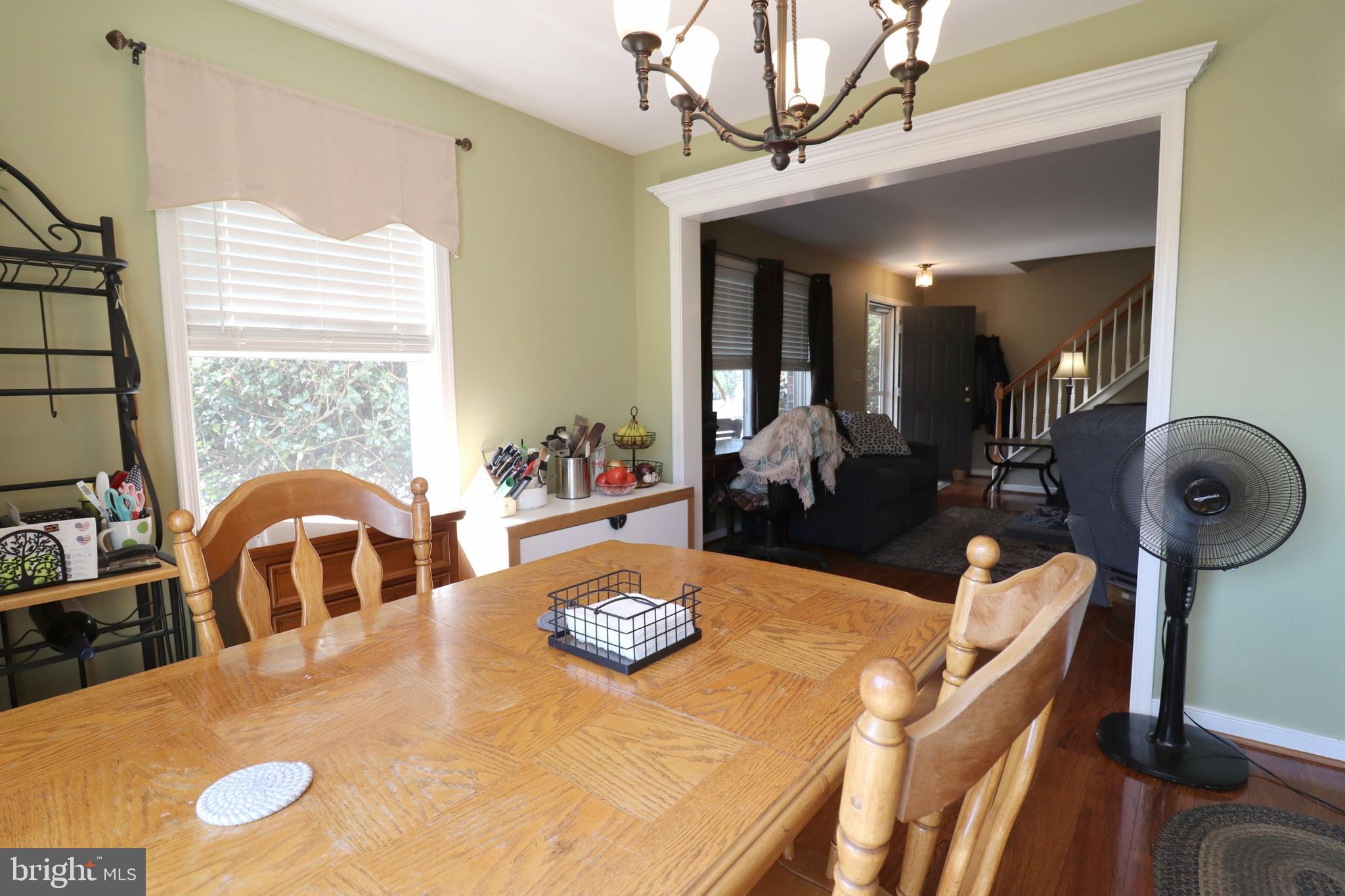 641 Chickadee Drive Lititz, PA 17543 - Photo 9 of 42 a view of a dining room with furniture and chandelier