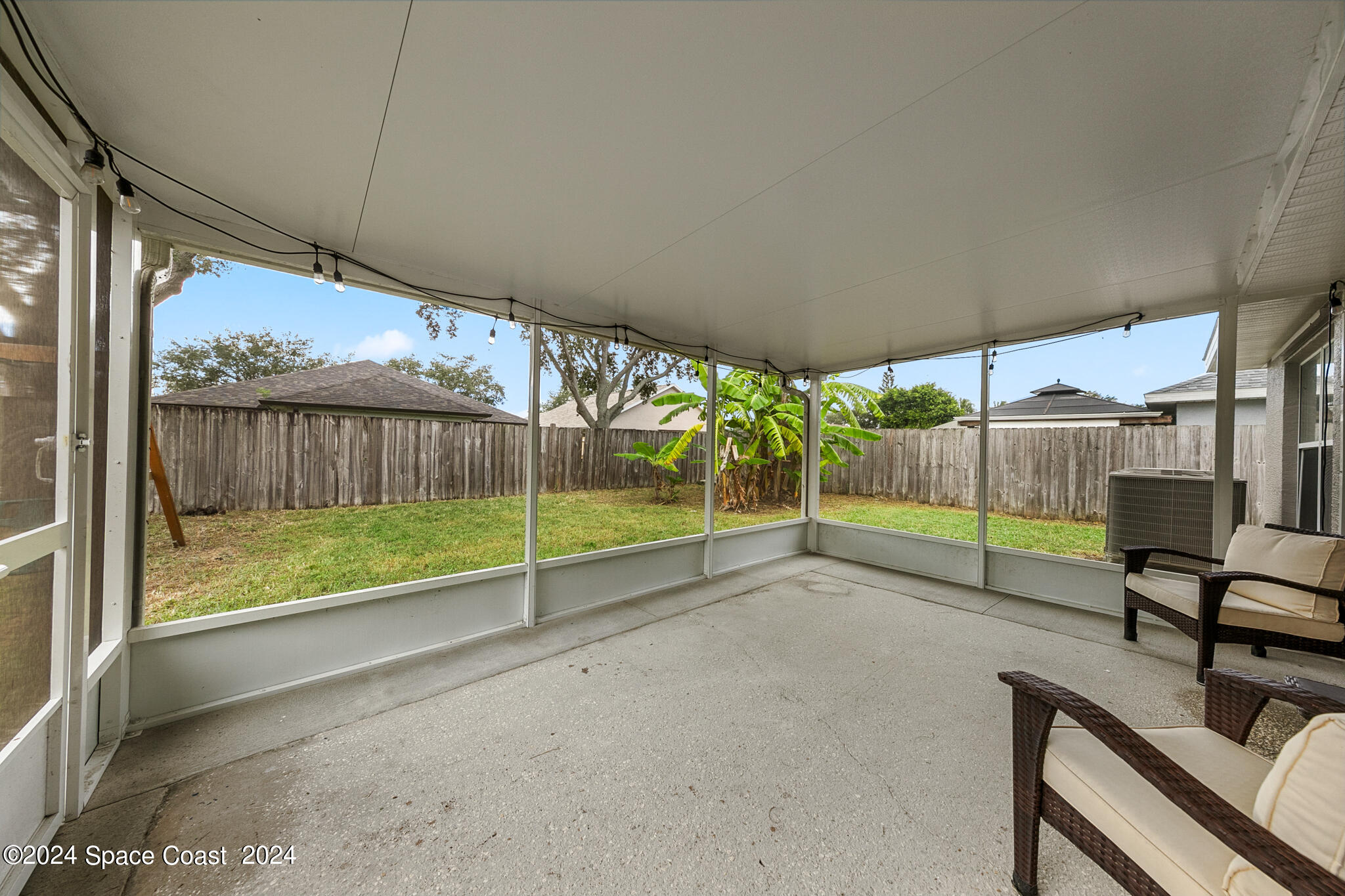 4631 Decatur Circle Melbourne, FL 32934 - Photo 30 of 35 a view of a room with wooden floor and wooden fence