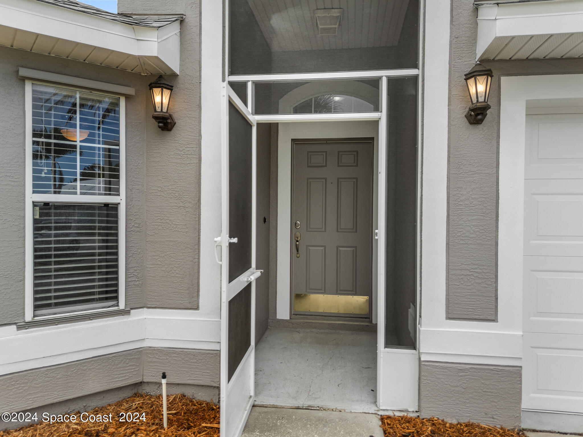 4631 Decatur Circle Melbourne, FL 32934 - Photo 4 of 35 a view of an entryway of house