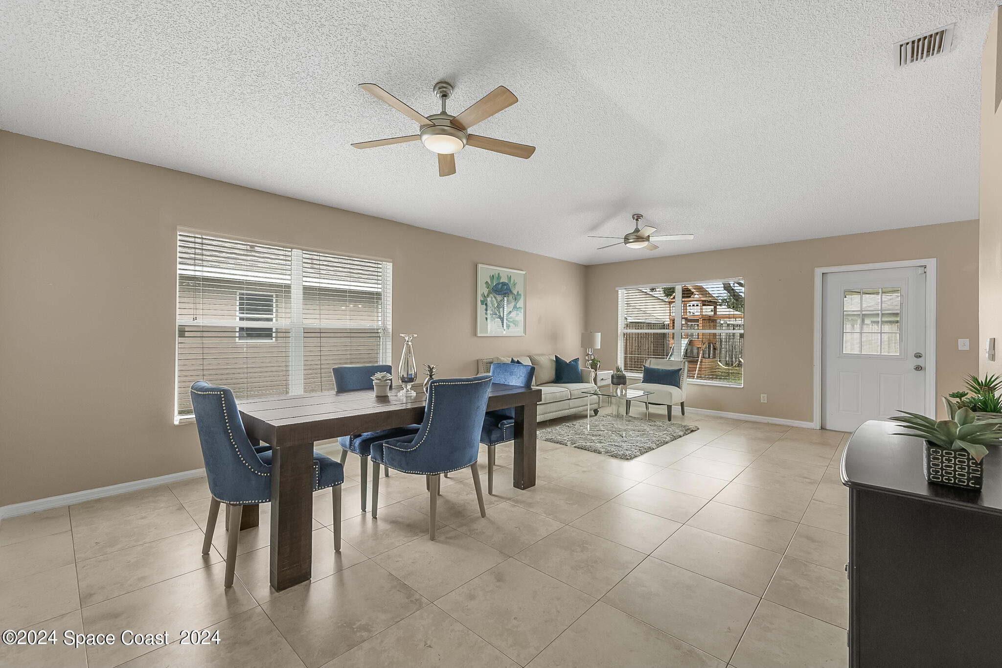 4631 Decatur Circle Melbourne, FL 32934 - Photo 7 of 35 a view of a dining room with furniture