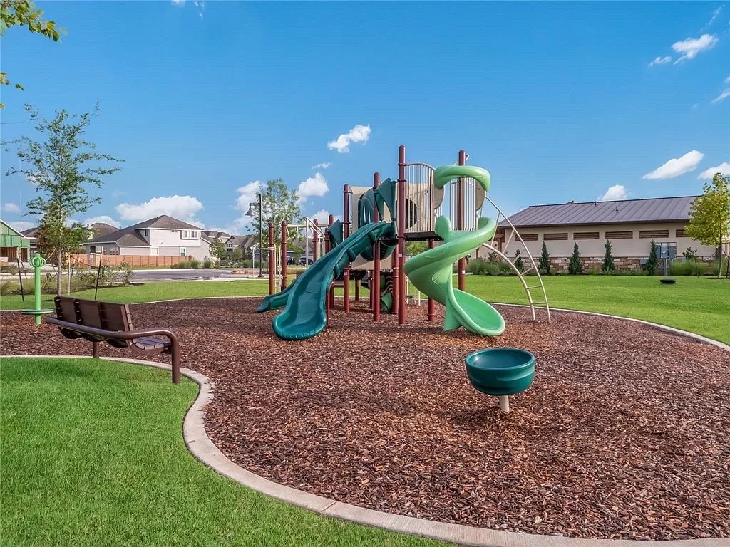 112 Concho Brook Bend Georgetown, TX 78626 - Photo 15 of 20 a view of a park with slide