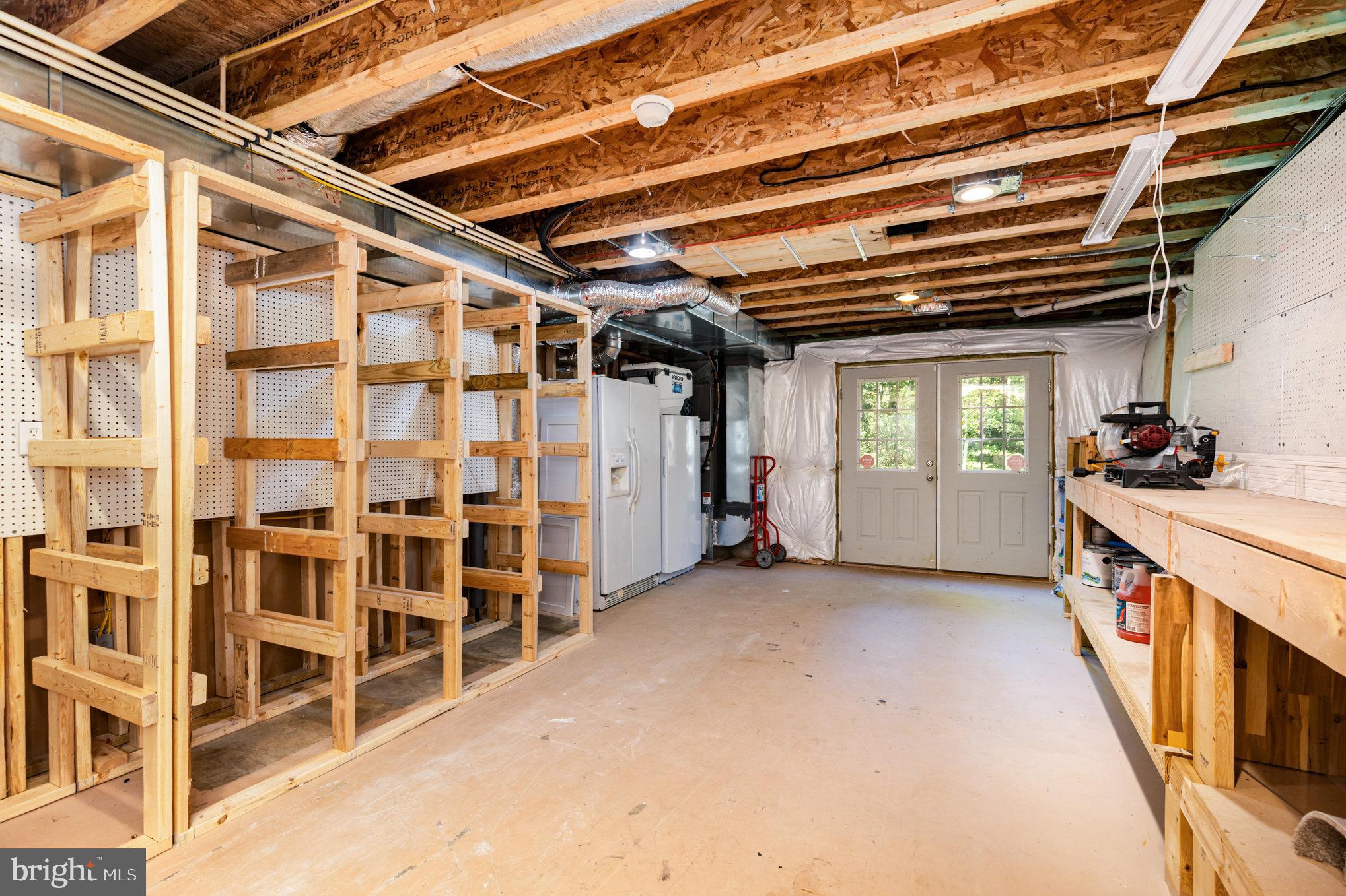 5428 Ridge Road Spotsylvania, VA 22551 - Photo 36 of 63 Storage Workshop Area with Shelves
