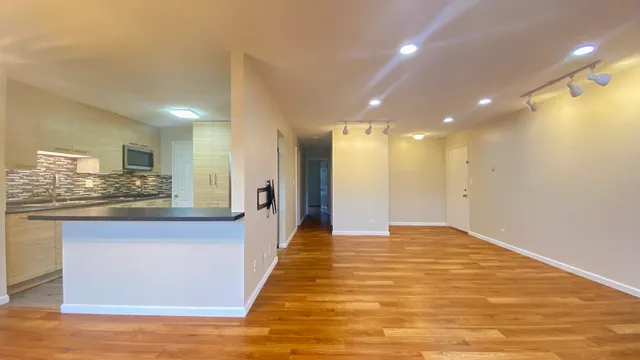 a view of a kitchen and kitchen counter top space