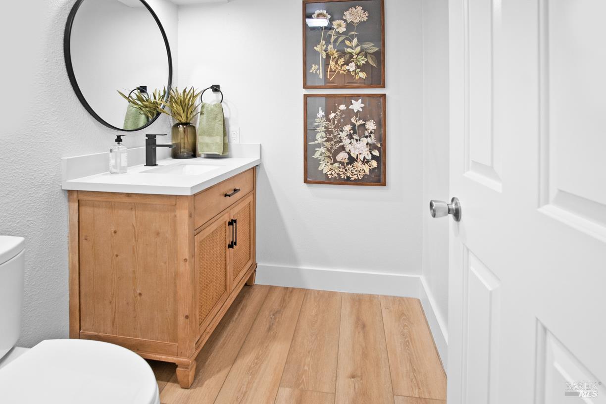 16 Drakes View Circle Greenbrae, CA 94904 - Photo 17 of 45 a bathroom with a sink and a mirror