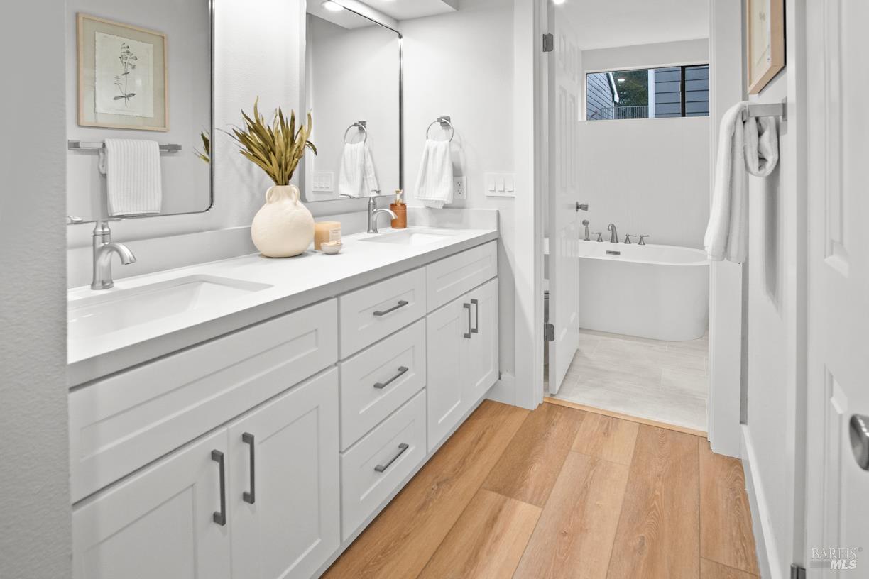 16 Drakes View Circle Greenbrae, CA 94904 - Photo 19 of 45 a bathroom with a sink and a mirror