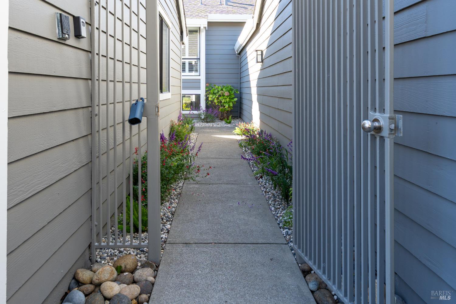 16 Drakes View Circle Greenbrae, CA 94904 - Photo 2 of 45 a view of a pathway with a house