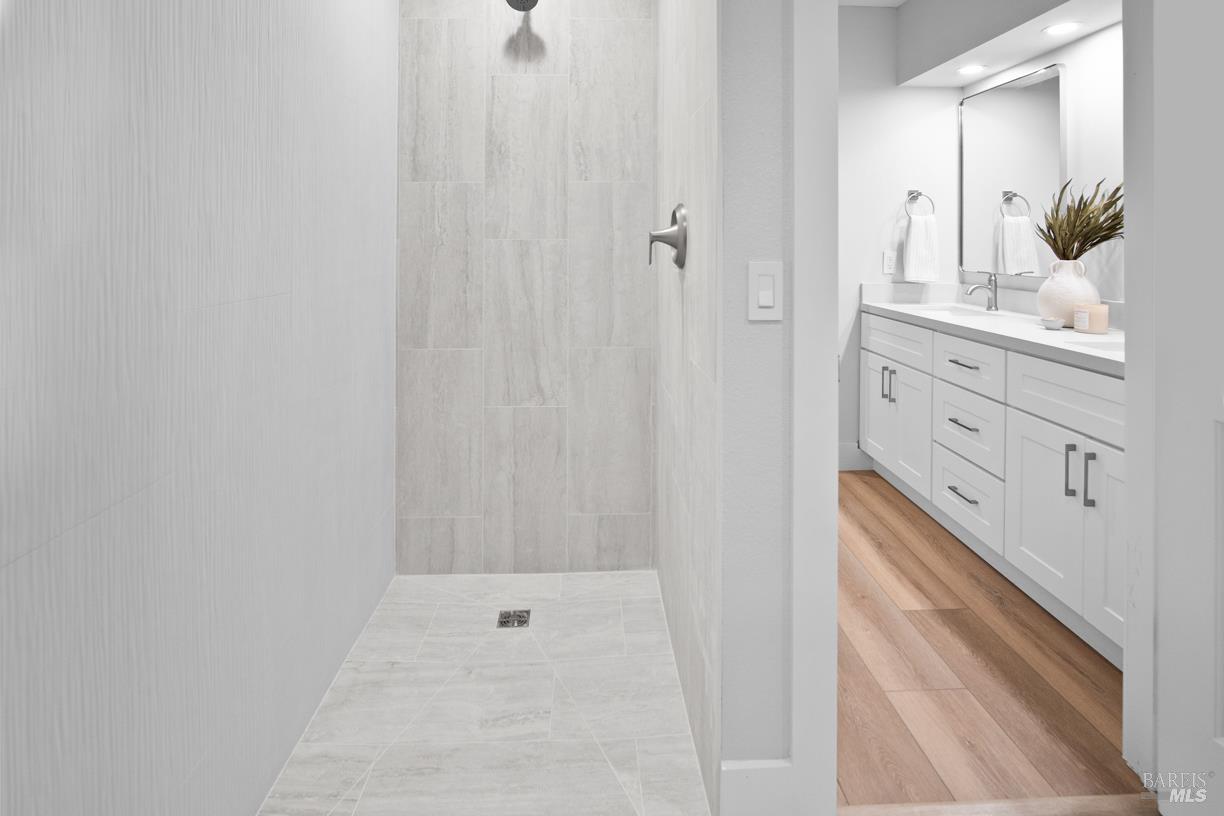 16 Drakes View Circle Greenbrae, CA 94904 - Photo 21 of 45 a bathroom with a shower and a sink