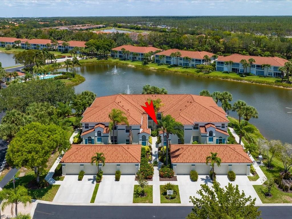 10910 Oak Island Road, Unit 103 Estero, FL 34135 - Photo 1 of 24 an aerial view of residential houses with outdoor space
