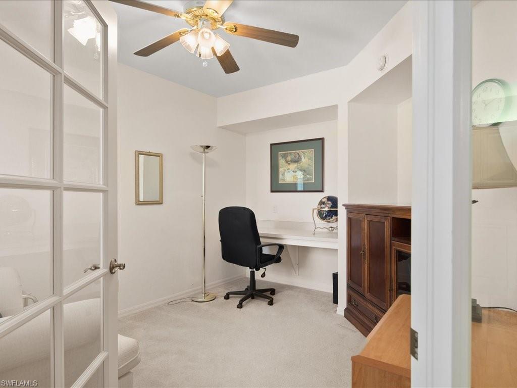 10910 Oak Island Road, Unit 103 Estero, FL 34135 - Photo 16 of 24 a view of a workspace with furniture and a window