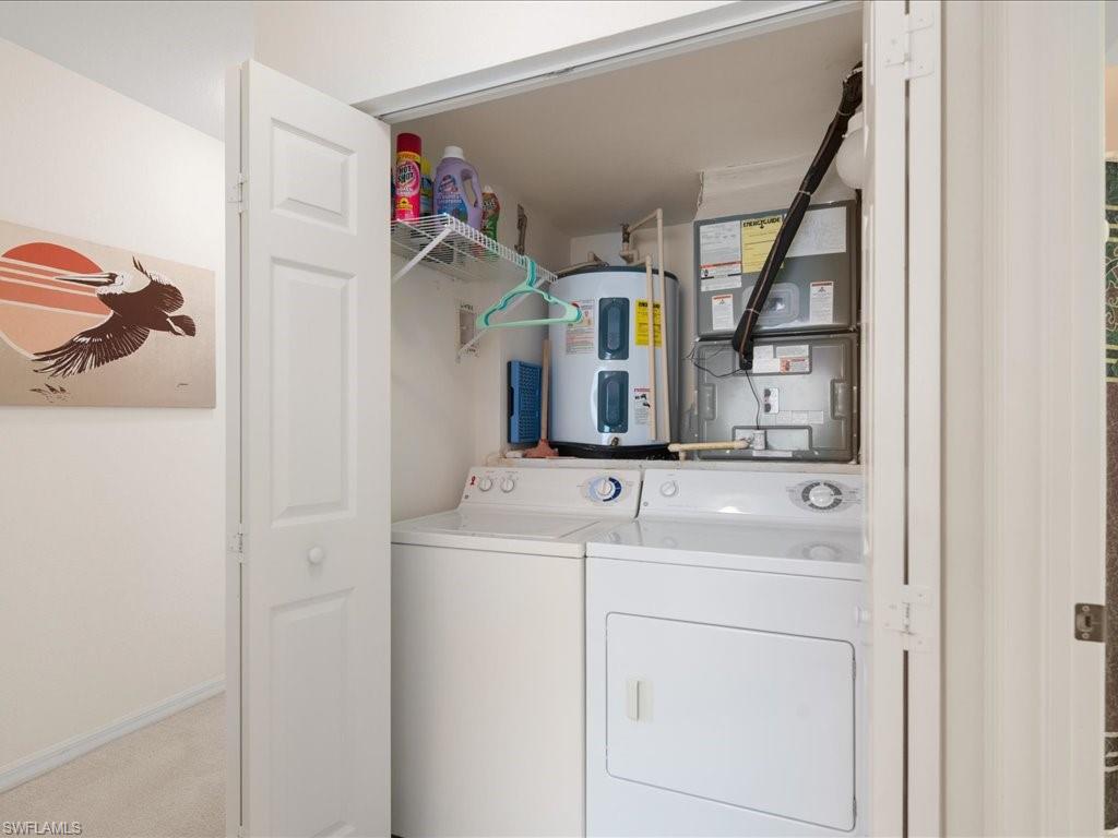 10910 Oak Island Road, Unit 103 Estero, FL 34135 - Photo 17 of 24 a bathroom with a sink and a mirror