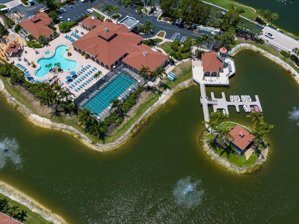 10910 Oak Island Road, Unit 103 Estero, FL 34135 - Photo 22 of 24 an aerial view of a house with a lake view