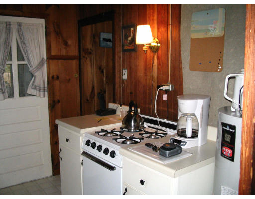 35 Aberdeen Road Goshen, MA 01096 - Photo 3 of 7 a kitchen with a stove and a refrigerator
