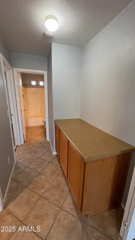 an empty room with a bathroom