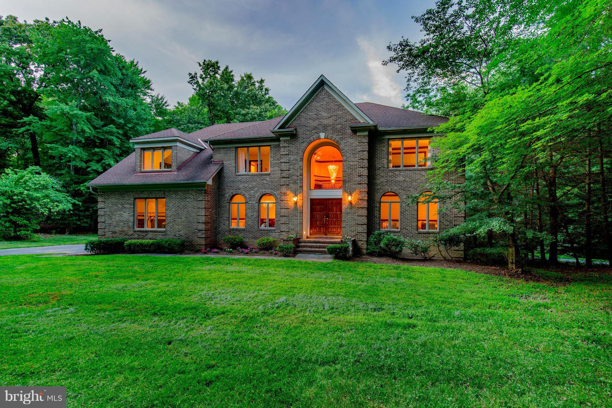 610 Bryants Nursery Road Silver Spring, MD 20905 - Photo 1 of 30 a front view of a house with a yard