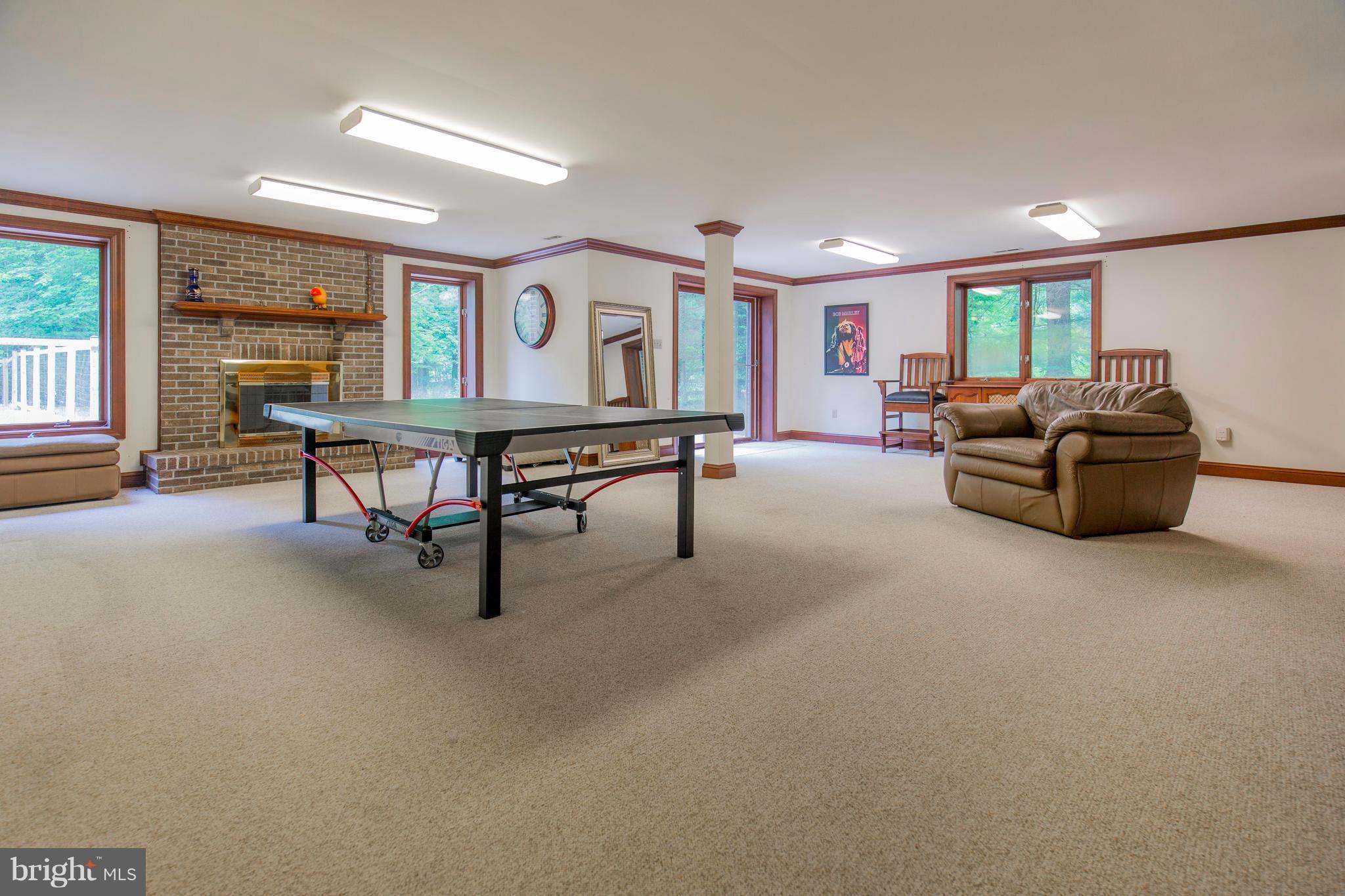 610 Bryants Nursery Road Silver Spring, MD 20905 - Photo 28 of 30 a living room with furniture and a large window