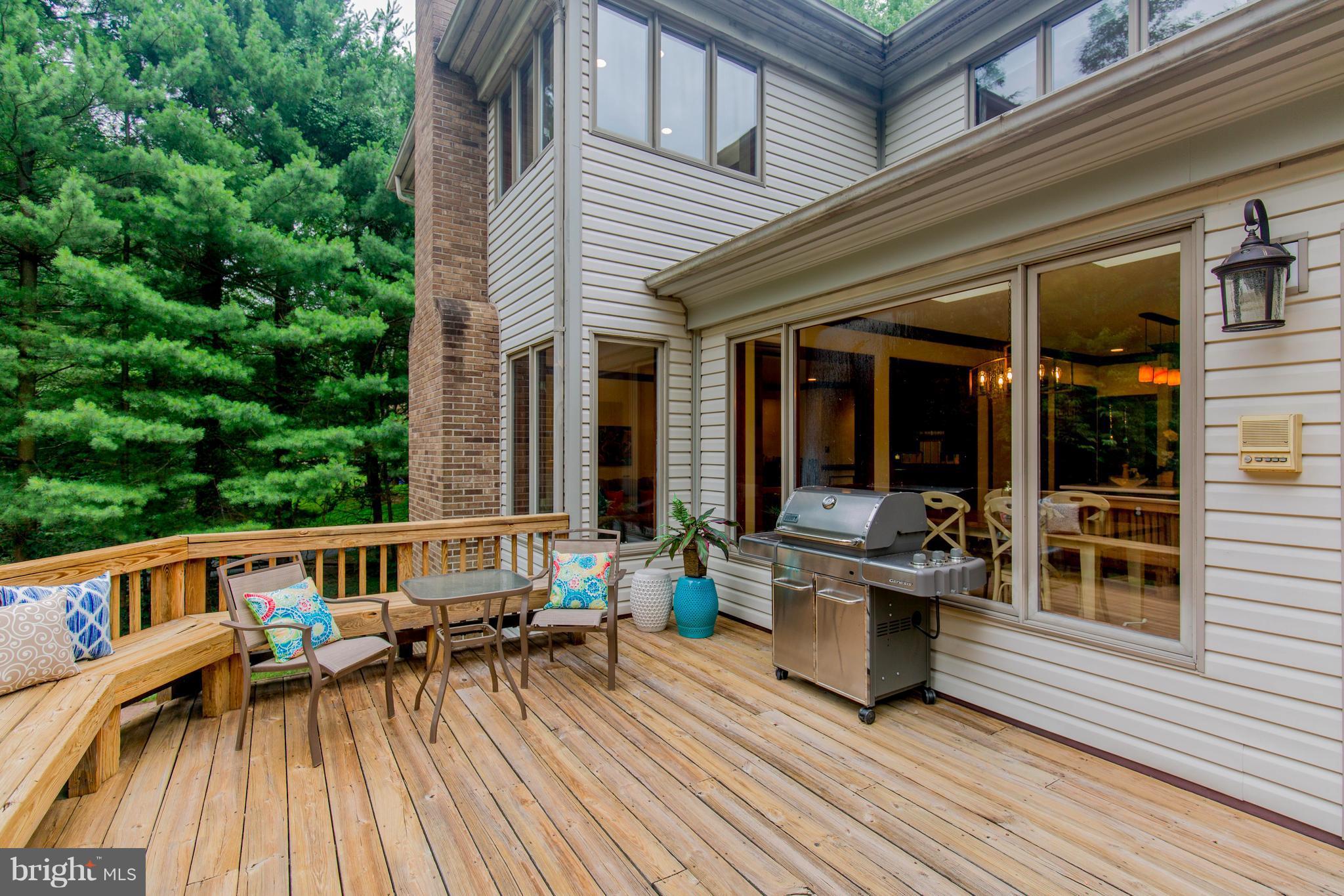610 Bryants Nursery Road Silver Spring, MD 20905 - Photo 4 of 30 a view of balcony with chairs and barbeque oven
