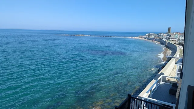 a view of a balcony with furniture