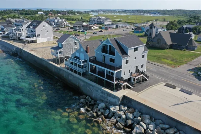 a view of a city with lawn chairs and a big yard