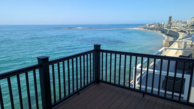 an aerial view of a house with a garden space