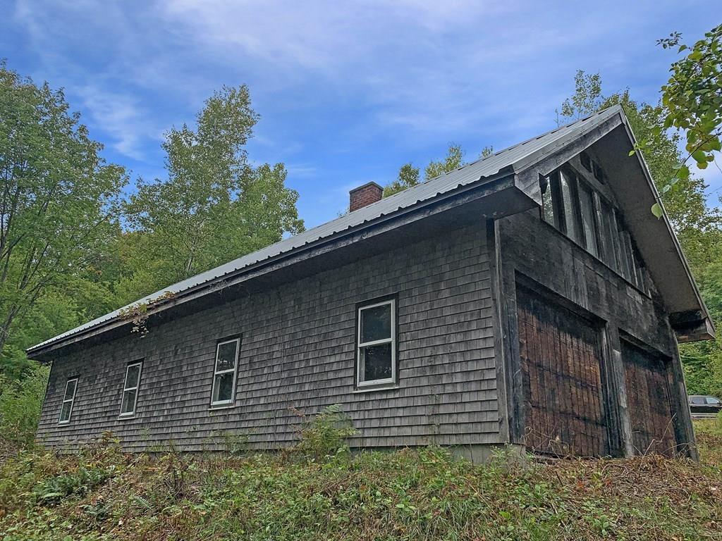 71 Prospect Hill Road Royalston, MA 01368 - Photo 2 of 16 a backyard of a house with lots of green space