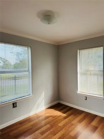 a view of an empty room and window