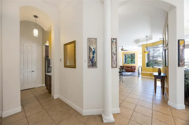 a room with gym equipment and windows