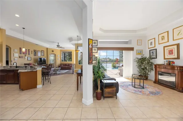 a view of a livingroom with furniture and a window