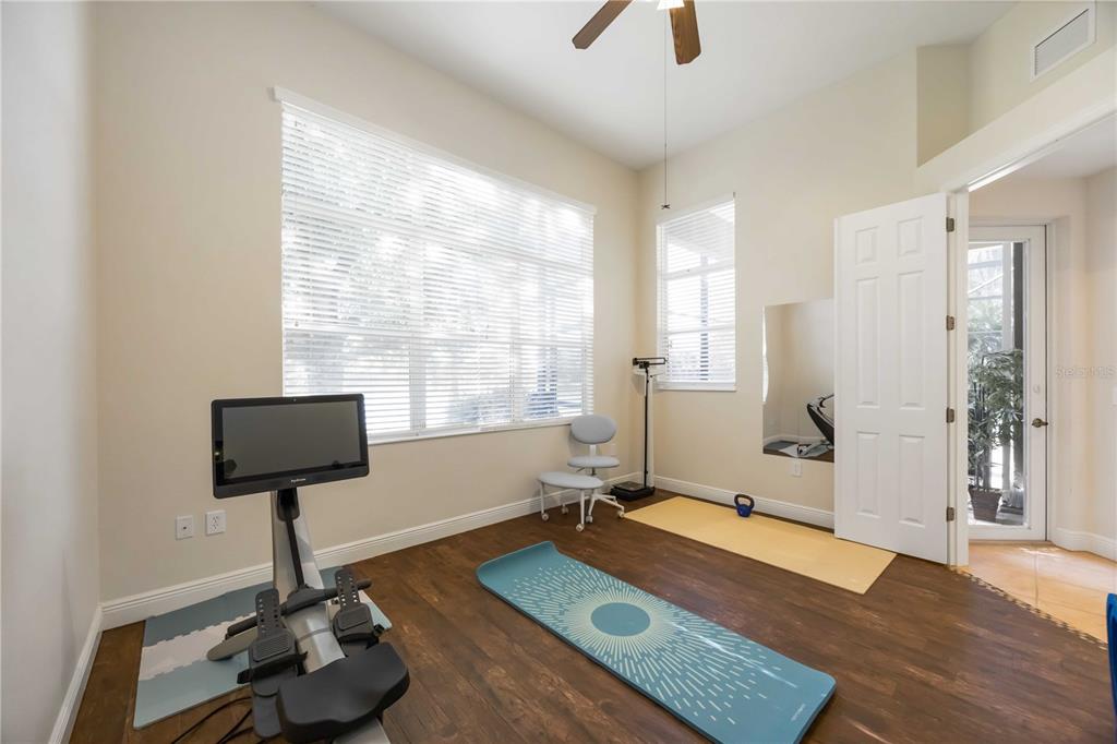 14806 Bowfin Terrace Lakewood Ranch, FL 34202 - Photo 36 of 95 a living room with furniture and a window