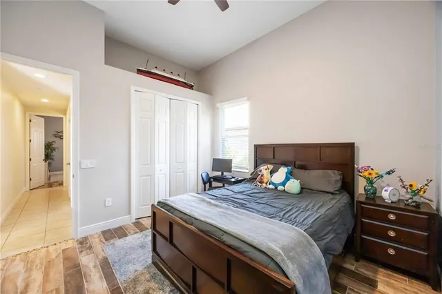 a view of a patio with a table and chairs under an umbrella