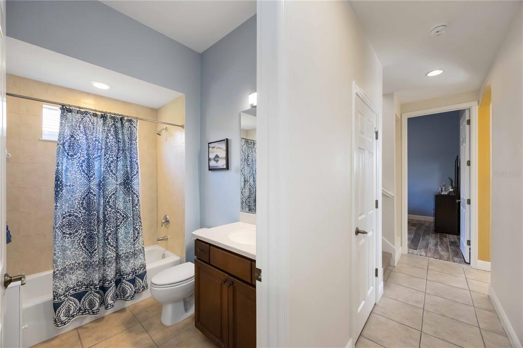 14806 Bowfin Terrace Lakewood Ranch, FL 34202 - Photo 45 of 95 a bathroom with a toilet sink and shower