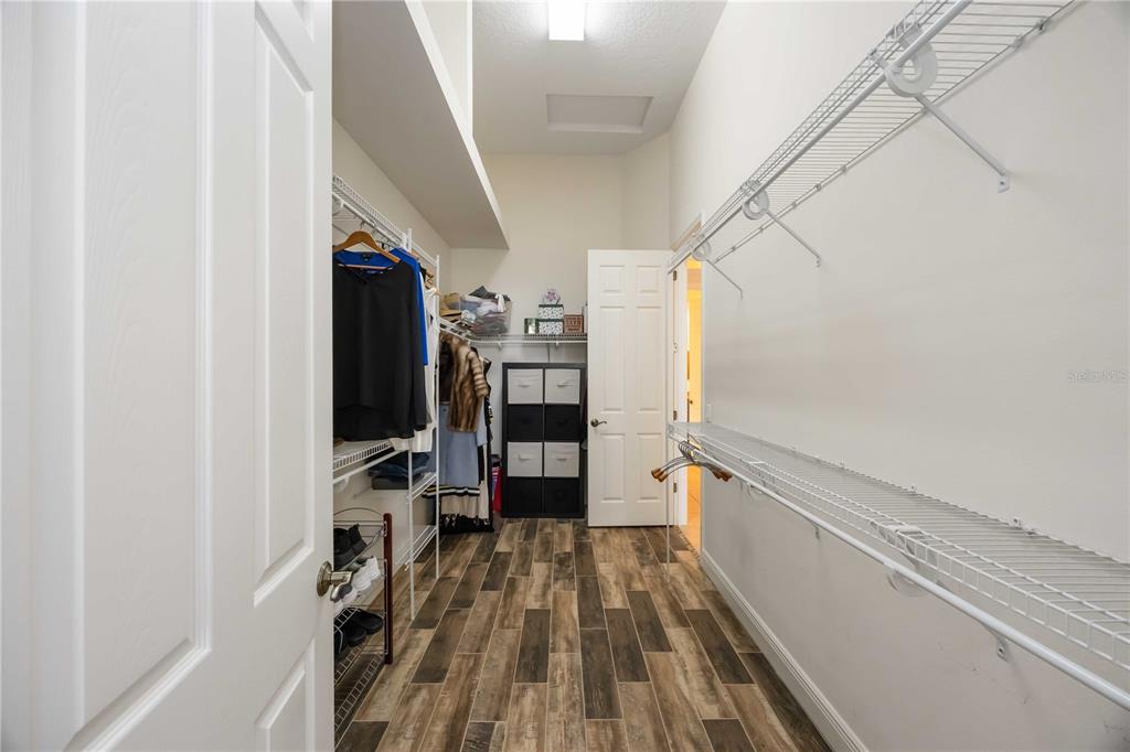 14806 Bowfin Terrace Lakewood Ranch, FL 34202 - Photo 53 of 95 a view of a walk in closet