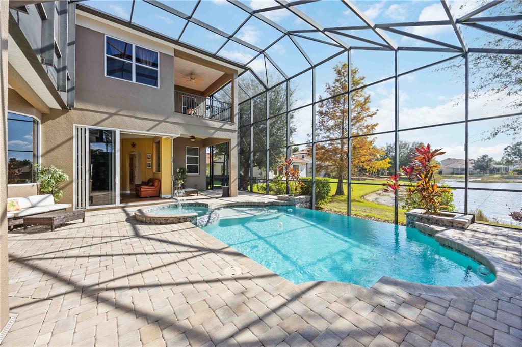 14806 Bowfin Terrace Lakewood Ranch, FL 34202 - Photo 77 of 95 a view of a house with sitting area and garden