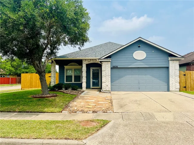 a house view with a outdoor space