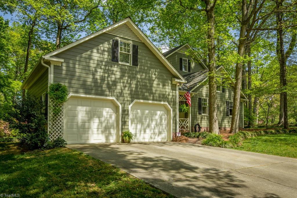 4240 Wayne Road Greensboro, NC 27407 - Photo 32 of 49 Garage w/more storage above