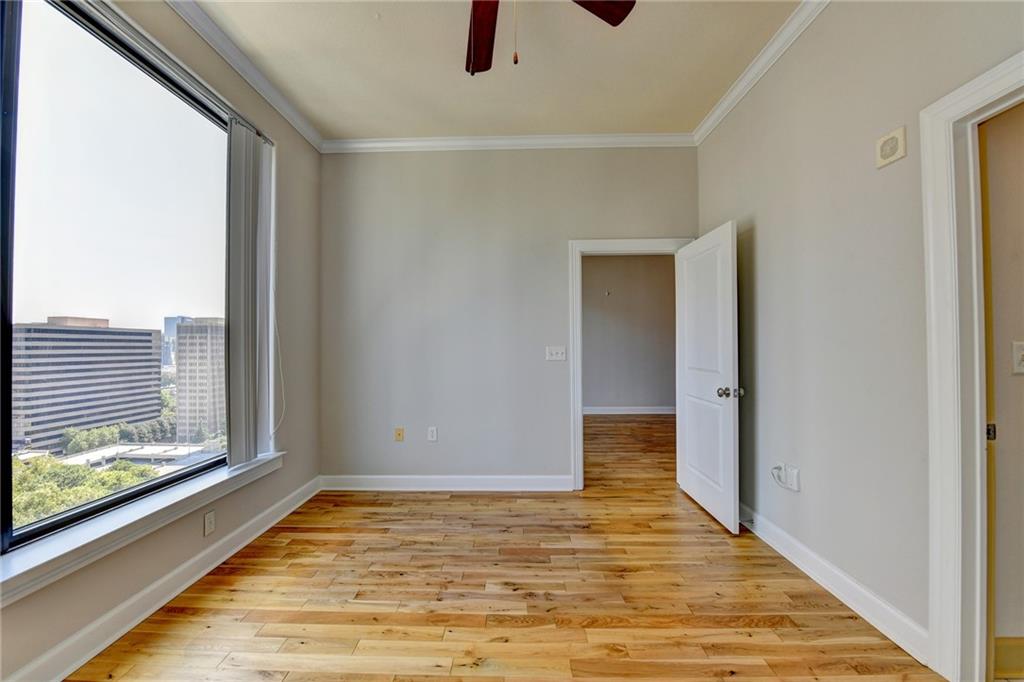 3445 Stratford Road Northeast, Unit 2106 Atlanta, GA 30326 - Photo 13 of 44 a view of an empty room with a window