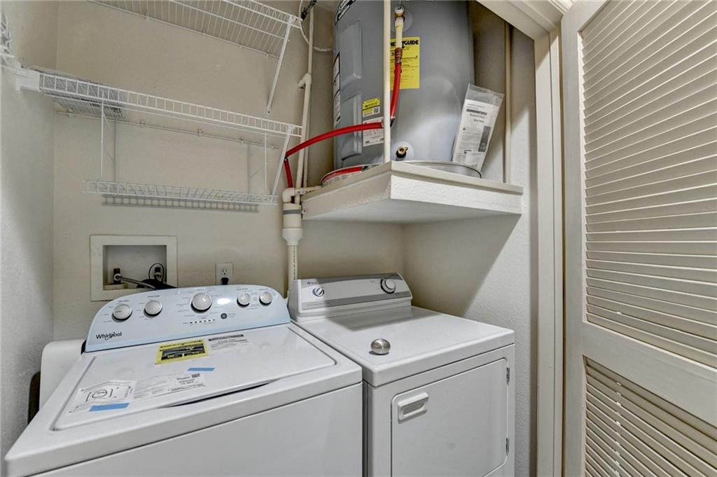 3445 Stratford Road Northeast, Unit 2106 Atlanta, GA 30326 - Photo 21 of 44 a utility room with dryer and washer