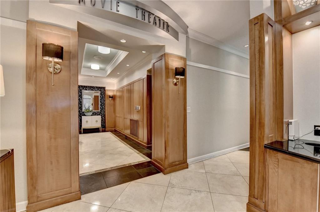 3445 Stratford Road Northeast, Unit 2106 Atlanta, GA 30326 - Photo 27 of 44 a view of a hallway with a living room