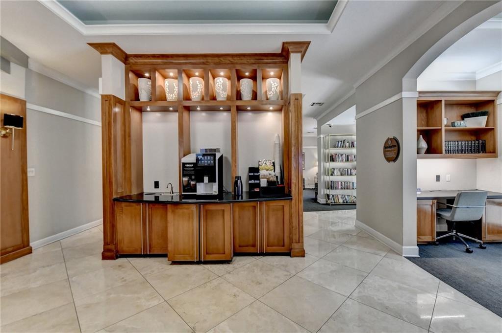 3445 Stratford Road Northeast, Unit 2106 Atlanta, GA 30326 - Photo 30 of 44 a view of a living room with a large window and a couch
