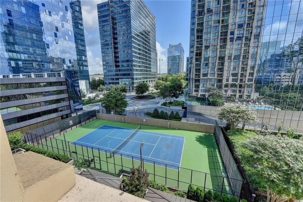 3445 Stratford Road Northeast, Unit 2106 Atlanta, GA 30326 - Photo 43 of 44 a view of a backyard with plants and outdoor seating