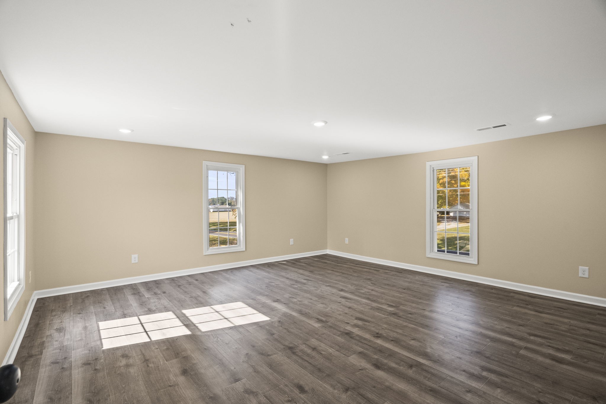 6081 Lakeview Road Springfield, TN 37172 - Photo 23 of 41 an empty room with wooden floor and windows