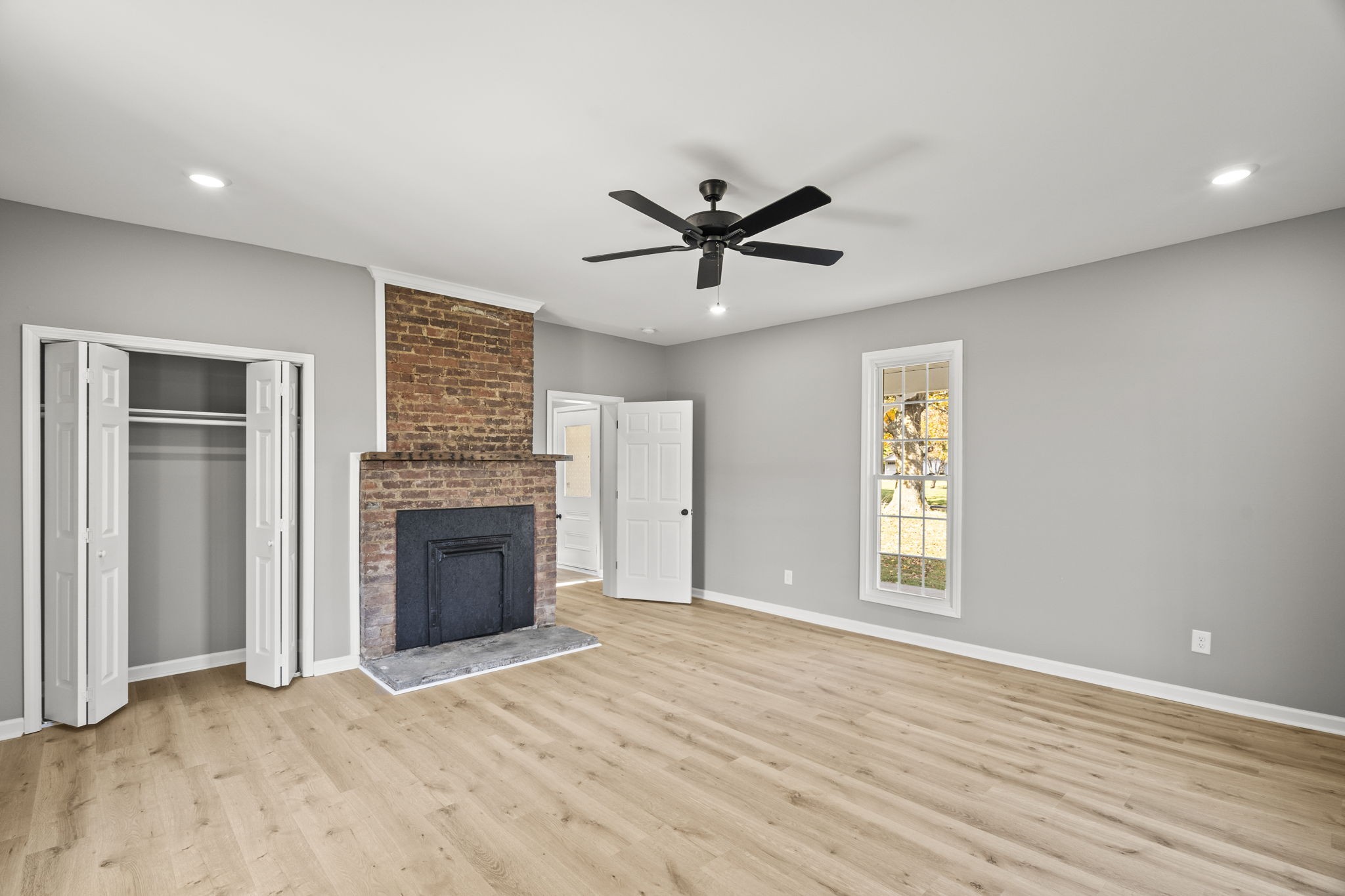 6081 Lakeview Road Springfield, TN 37172 - Photo 4 of 41 a view of empty room with a fireplace and a window