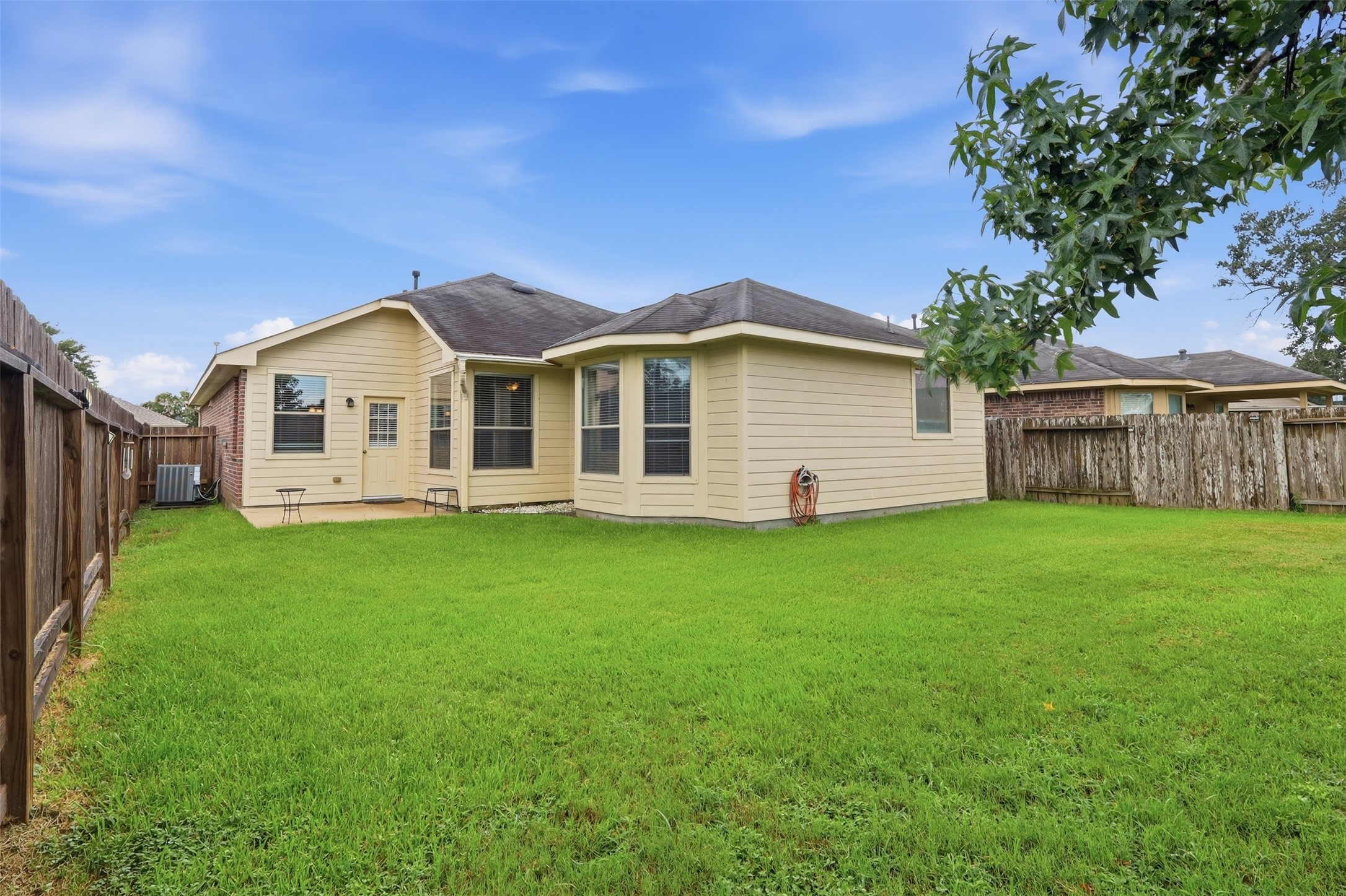 1911 Vale Brook Drive Spring, TX 77373 - Photo 24 of 27 The fully fenced backyard offers plenty of room to relax, play, or entertain outdoors.