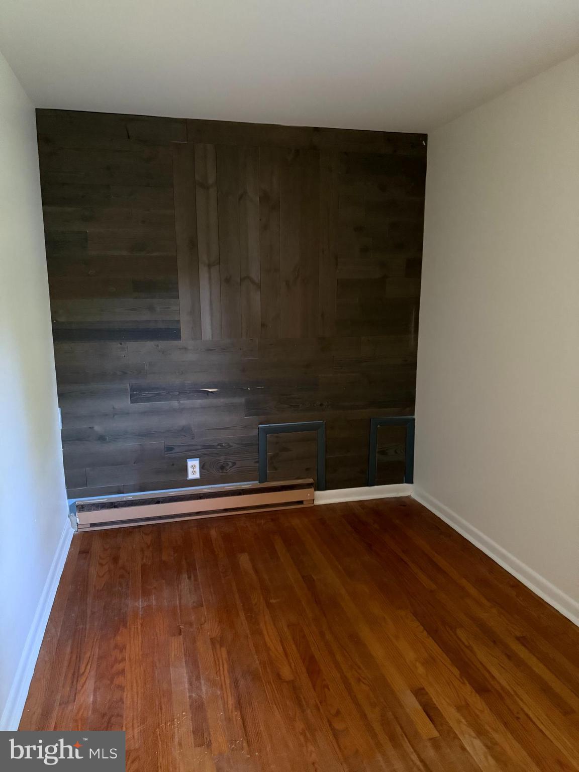 24975 Kruger Road Georgetown, DE 19947 - Photo 15 of 19 a view of room with wooden floor