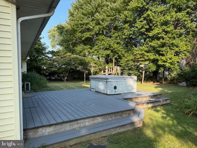 24975 Kruger Road Georgetown, DE 19947 - Photo 18 of 19 a view of a backyard with a sitting area
